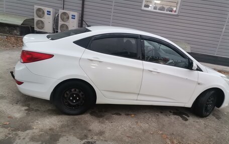 Hyundai Solaris II рестайлинг, 2013 год, 600 000 рублей, 3 фотография