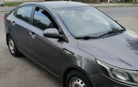 KIA Rio III рестайлинг, 2012 год, 630 000 рублей, 10 фотография