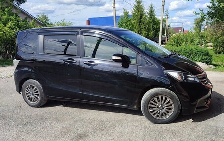 Honda Freed I, 2013 год, 1 150 000 рублей, 13 фотография