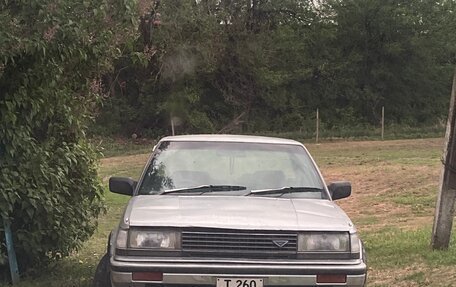 Nissan Bluebird VIII, 1986 год, 166 000 рублей, 1 фотография