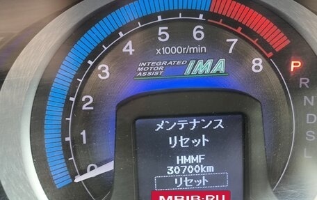 Honda Insight II рестайлинг, 2010 год, 1 100 000 рублей, 21 фотография