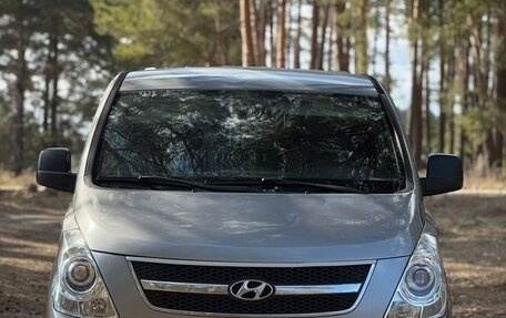 Hyundai Grand Starex Grand Starex I рестайлинг 2, 2011 год, 1 560 000 рублей, 2 фотография