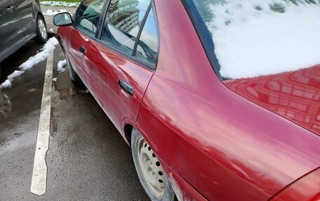 Mitsubishi Mirage VI рестайлинг, 2001 год, 230 000 рублей, 6 фотография