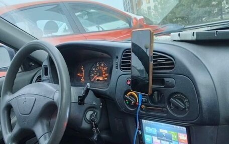 Mitsubishi Mirage VI рестайлинг, 2001 год, 230 000 рублей, 14 фотография