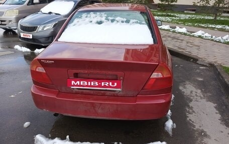 Mitsubishi Mirage VI рестайлинг, 2001 год, 230 000 рублей, 8 фотография
