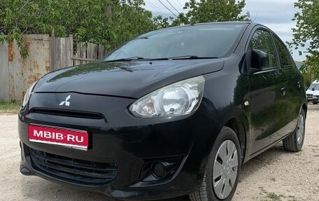Mitsubishi Mirage VI рестайлинг, 2013 год, 730 000 рублей, 1 фотография