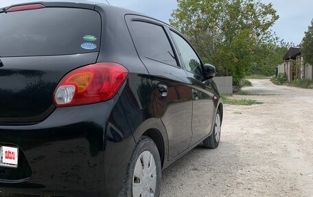 Mitsubishi Mirage VI рестайлинг, 2013 год, 730 000 рублей, 7 фотография