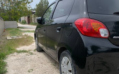 Mitsubishi Mirage VI рестайлинг, 2013 год, 730 000 рублей, 6 фотография