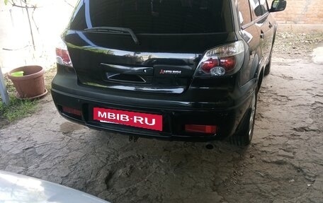 Mitsubishi Outlander III рестайлинг 3, 2006 год, 490 000 рублей, 3 фотография