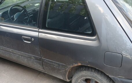Mazda 323, 1994 год, 127 000 рублей, 4 фотография