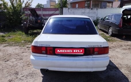 Mitsubishi Lancer VII, 1995 год, 140 000 рублей, 4 фотография