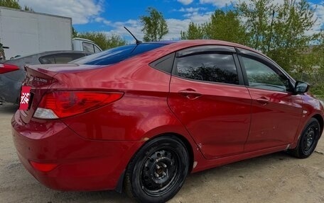 Hyundai Solaris II рестайлинг, 2011 год, 700 000 рублей, 4 фотография