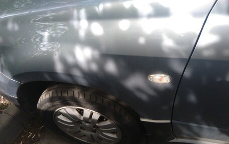 Mitsubishi Outlander III рестайлинг 3, 2006 год, 700 000 рублей, 4 фотография