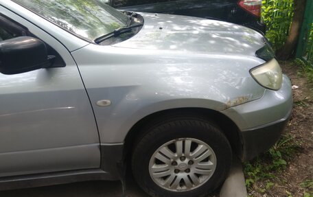 Mitsubishi Outlander III рестайлинг 3, 2006 год, 700 000 рублей, 10 фотография