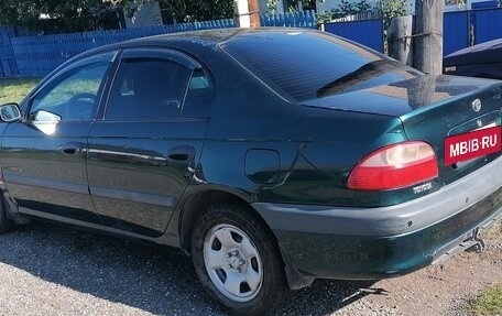 Toyota Avensis III рестайлинг, 2001 год, 380 000 рублей, 7 фотография