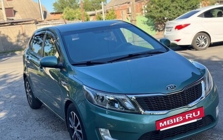 KIA Rio III рестайлинг, 2012 год, 990 000 рублей, 4 фотография