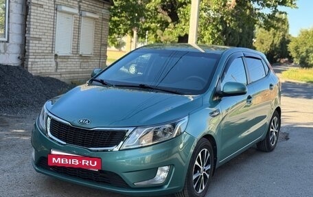 KIA Rio III рестайлинг, 2012 год, 990 000 рублей, 9 фотография