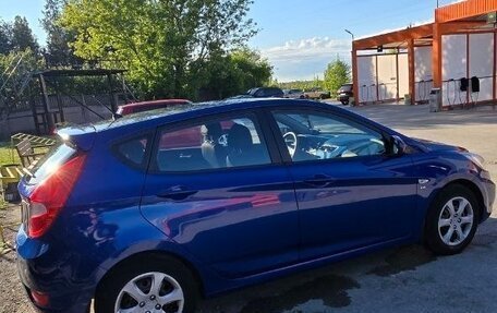 Hyundai Solaris II рестайлинг, 2011 год, 980 000 рублей, 23 фотография