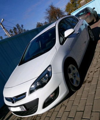 Opel Astra J рестайлинг, 2014 год, 950 000 рублей, 1 фотография
