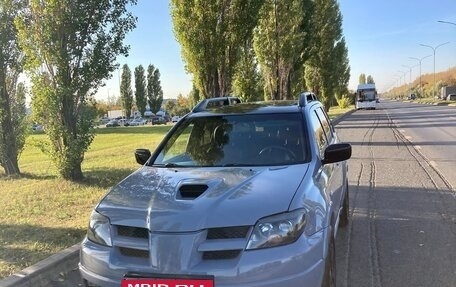 Mitsubishi Outlander III рестайлинг 3, 2004 год, 900 000 рублей, 2 фотография