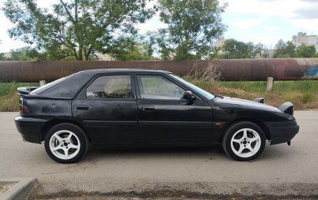 Mazda 323, 1990 год, 280 000 рублей, 5 фотография
