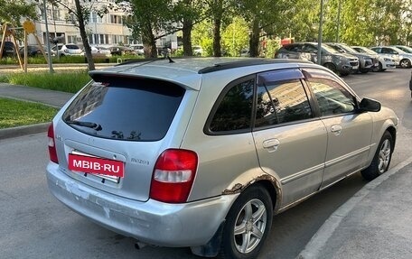 Mazda Familia, 1998 год, 129 000 рублей, 3 фотография