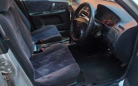 Mazda Familia Y10, 1999 год, 280 000 рублей, 10 фотография