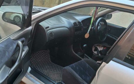 Mazda Familia Y10, 1999 год, 280 000 рублей, 9 фотография