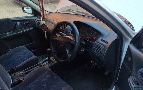Mazda Familia Y10, 1999 год, 280 000 рублей, 8 фотография