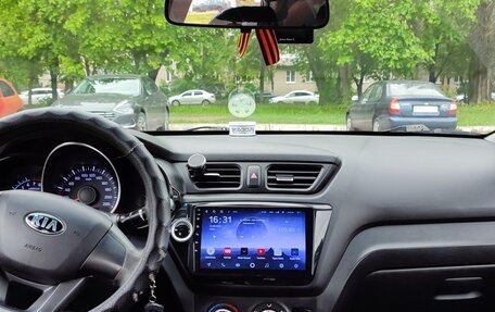 KIA Rio III рестайлинг, 2013 год, 750 000 рублей, 10 фотография