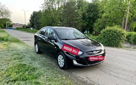 Hyundai Solaris II рестайлинг, 2011 год, 600 000 рублей, 8 фотография