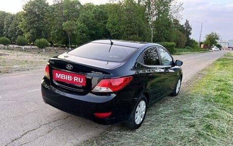 Hyundai Solaris II рестайлинг, 2011 год, 600 000 рублей, 9 фотография
