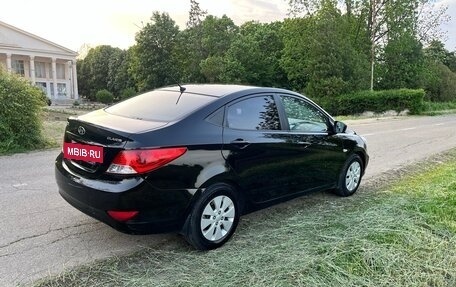 Hyundai Solaris II рестайлинг, 2011 год, 600 000 рублей, 10 фотография