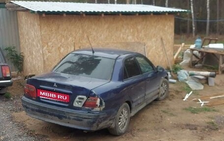 Mitsubishi Carisma I, 2003 год, 140 000 рублей, 2 фотография