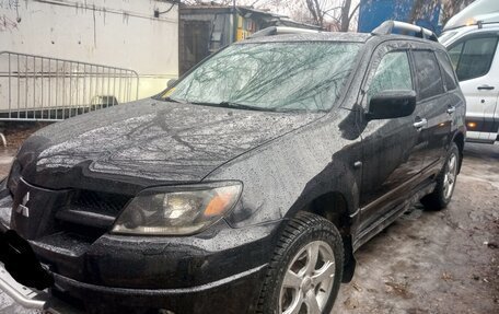 Mitsubishi Outlander III рестайлинг 3, 2004 год, 1 000 000 рублей, 11 фотография