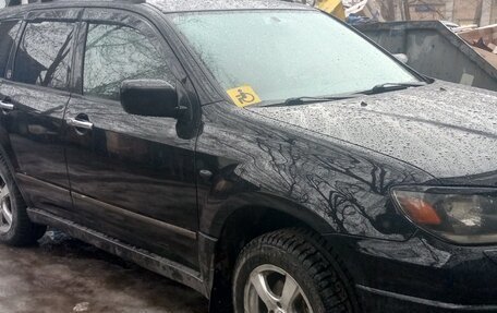 Mitsubishi Outlander III рестайлинг 3, 2004 год, 1 000 000 рублей, 10 фотография