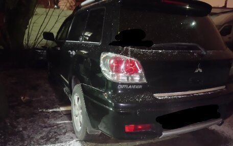 Mitsubishi Outlander III рестайлинг 3, 2004 год, 1 000 000 рублей, 9 фотография