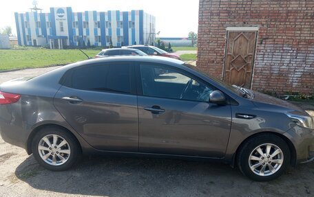 KIA Rio III рестайлинг, 2013 год, 980 000 рублей, 3 фотография