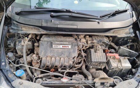 Honda Insight II рестайлинг, 2009 год, 900 000 рублей, 24 фотография
