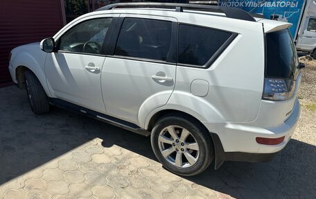 Mitsubishi Outlander III рестайлинг 3, 2011 год, 900 000 рублей, 4 фотография