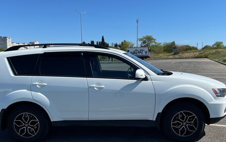 Mitsubishi Outlander III рестайлинг 3, 2011 год, 1 199 000 рублей, 13 фотография