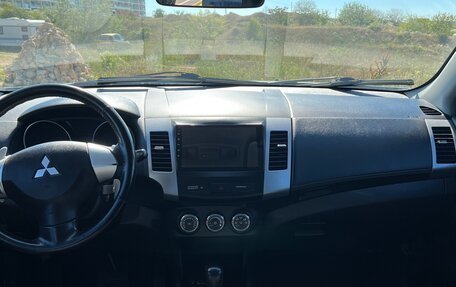 Mitsubishi Outlander III рестайлинг 3, 2011 год, 1 199 000 рублей, 23 фотография