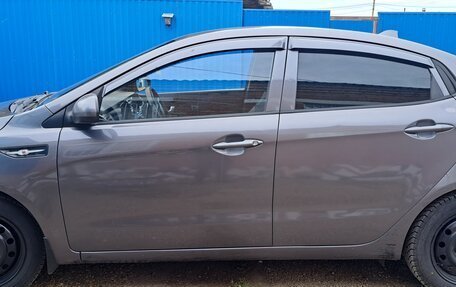KIA Rio III рестайлинг, 2012 год, 750 000 рублей, 3 фотография