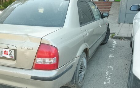 Mazda 323, 1998 год, 170 000 рублей, 6 фотография