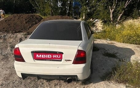 Mazda Familia, 1999 год, 300 000 рублей, 3 фотография