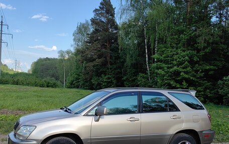 Lexus RX IV рестайлинг, 2000 год, 850 000 рублей, 3 фотография