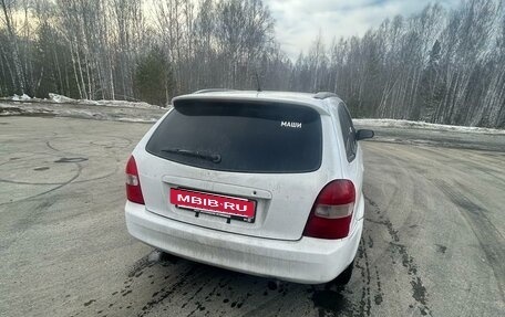 Mazda Familia, 1999 год, 255 000 рублей, 3 фотография