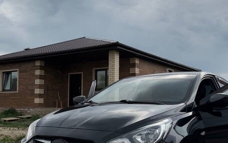 Hyundai Solaris II рестайлинг, 2011 год, 670 000 рублей, 2 фотография