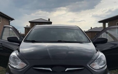 Hyundai Solaris II рестайлинг, 2011 год, 670 000 рублей, 3 фотография