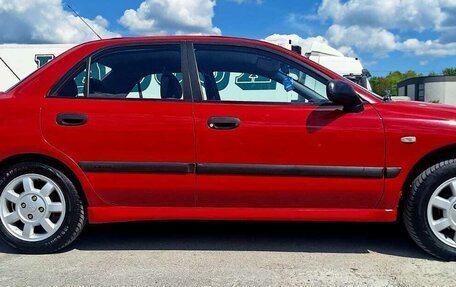 Mitsubishi Carisma I, 1999 год, 395 000 рублей, 6 фотография